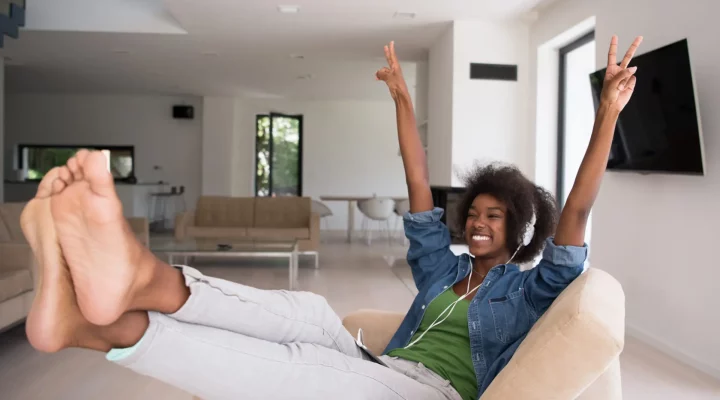 A GIrl enjoying her TV and Home theater